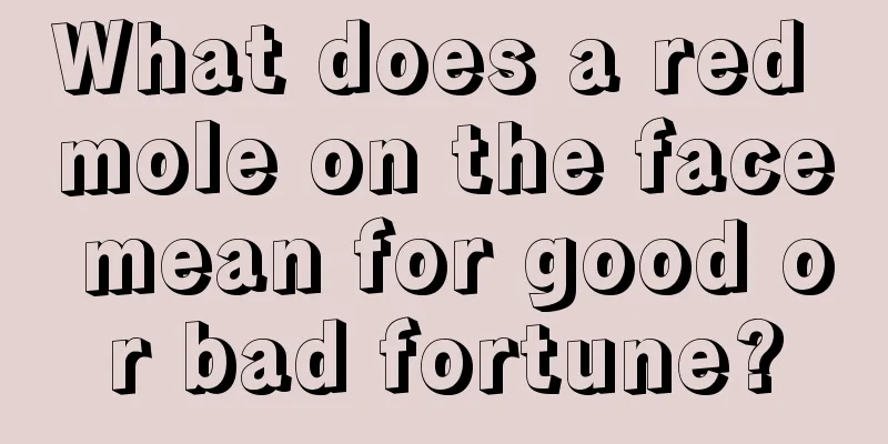 What does a red mole on the face mean for good or bad fortune?
