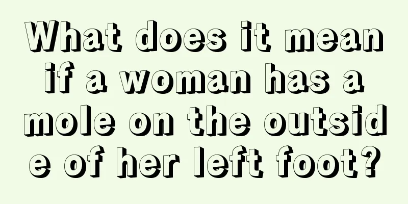 What does it mean if a woman has a mole on the outside of her left foot?