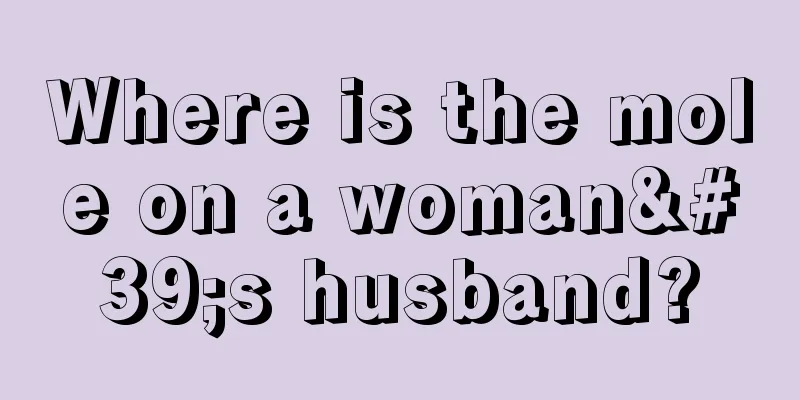 Where is the mole on a woman's husband?