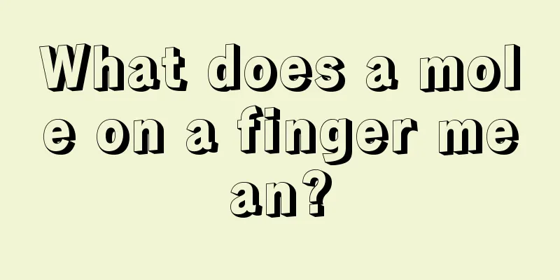 What does a mole on a finger mean?