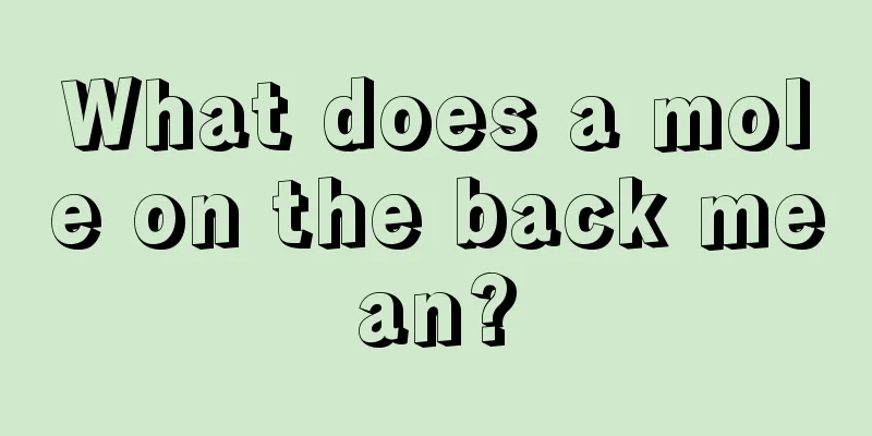 What does a mole on the back mean?