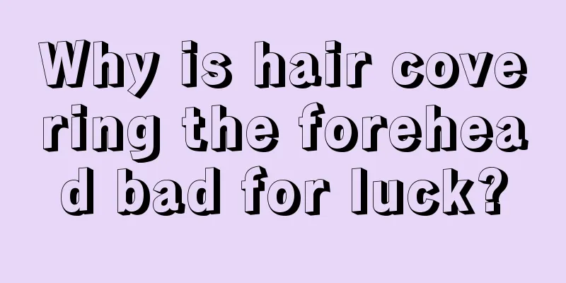Why is hair covering the forehead bad for luck?