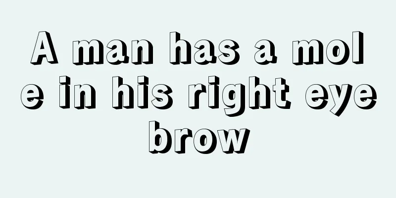 A man has a mole in his right eyebrow