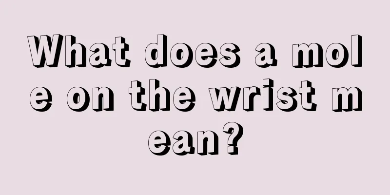 What does a mole on the wrist mean?