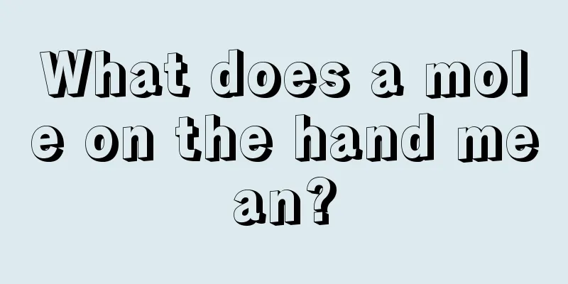 What does a mole on the hand mean?