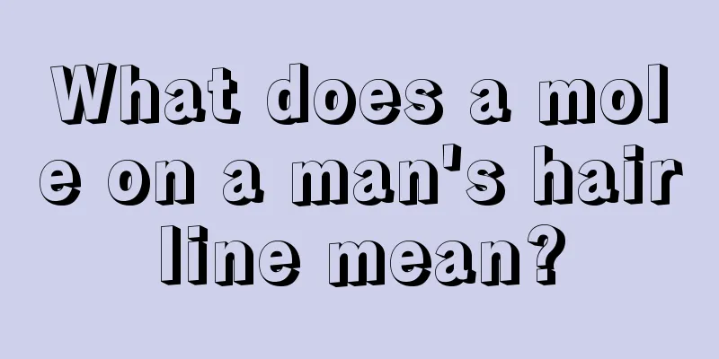What does a mole on a man's hairline mean?