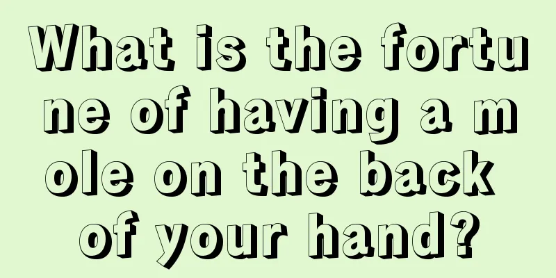 What is the fortune of having a mole on the back of your hand?