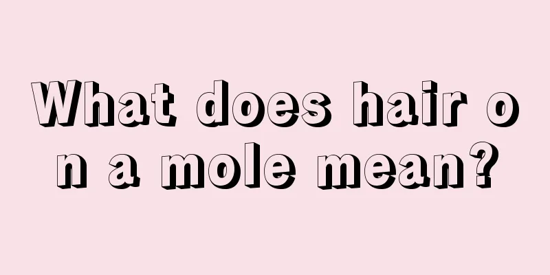What does hair on a mole mean?