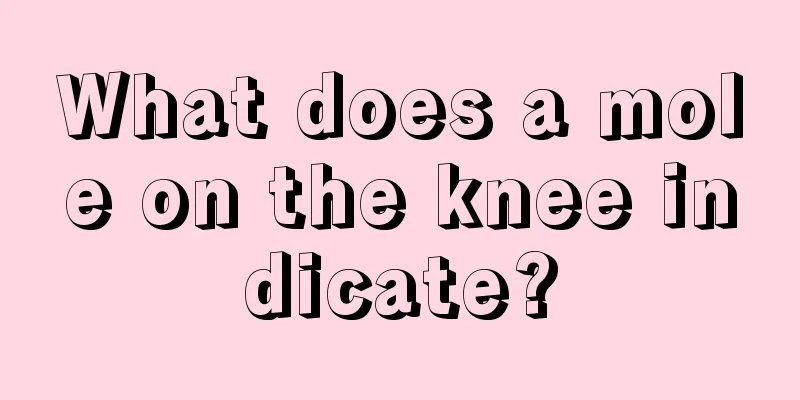 What does a mole on the knee indicate?