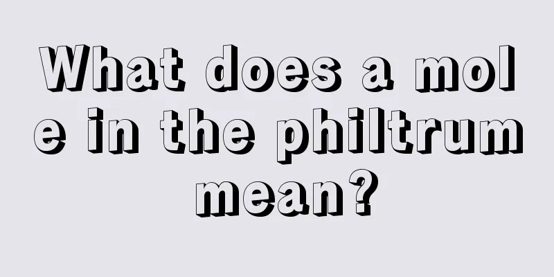 What does a mole in the philtrum mean?