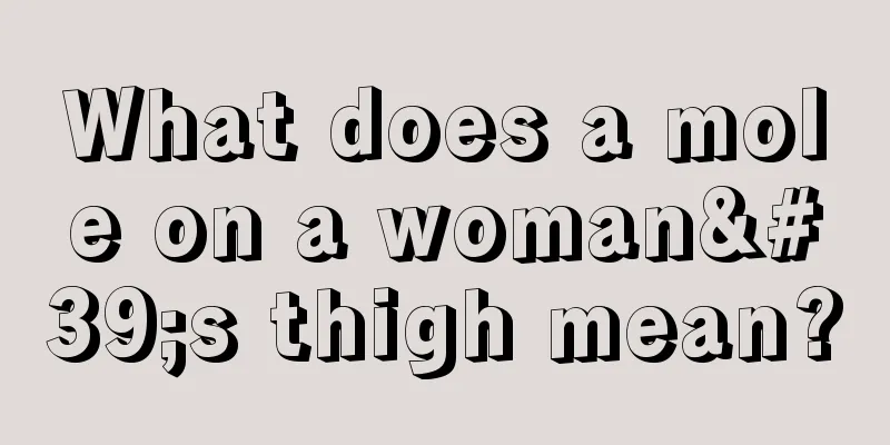 What does a mole on a woman's thigh mean?