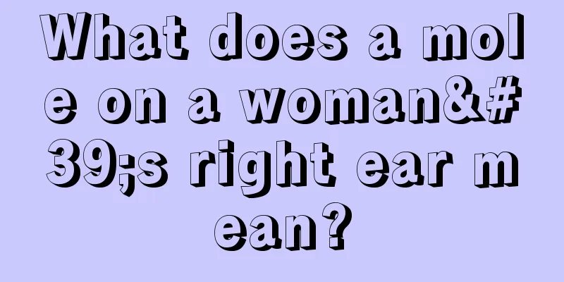What does a mole on a woman's right ear mean?