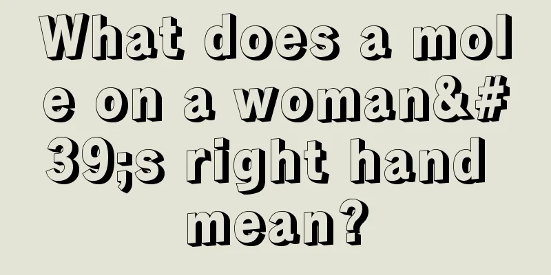What does a mole on a woman's right hand mean?