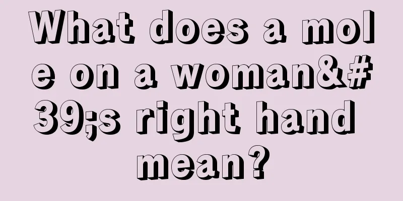 What does a mole on a woman's right hand mean?