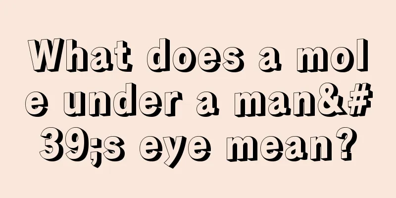 What does a mole under a man's eye mean?