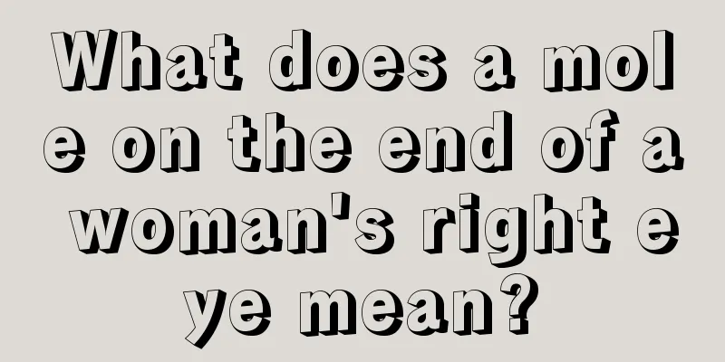 What does a mole on the end of a woman's right eye mean?
