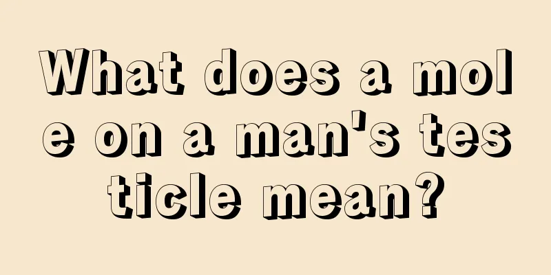 What does a mole on a man's testicle mean?