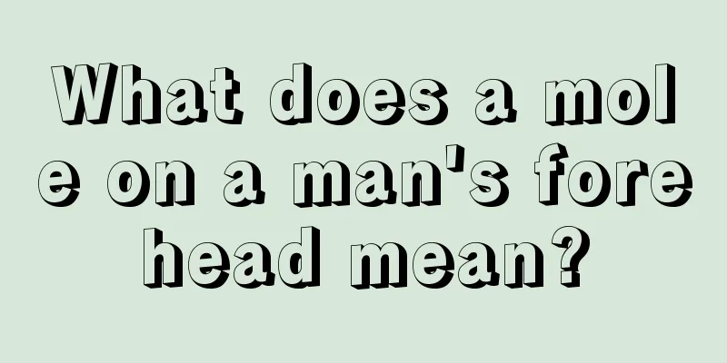 What does a mole on a man's forehead mean?