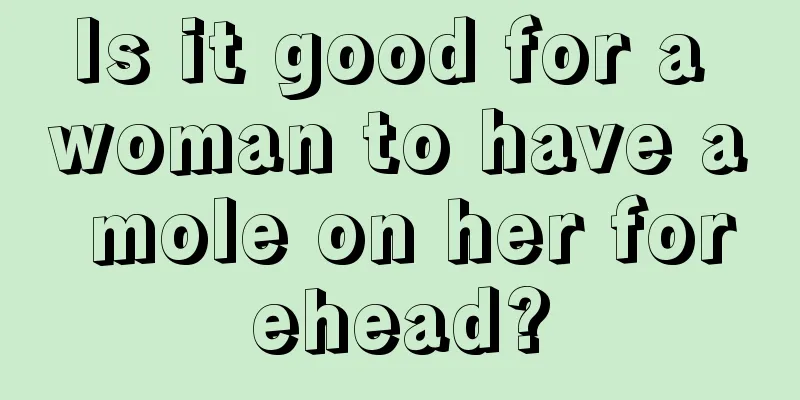 Is it good for a woman to have a mole on her forehead?