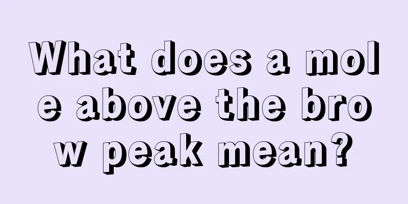 What does a mole above the brow peak mean?