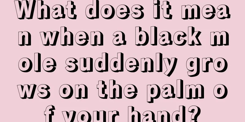 What does it mean when a black mole suddenly grows on the palm of your hand?