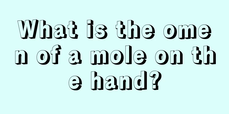 What is the omen of a mole on the hand?