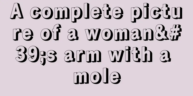 A complete picture of a woman's arm with a mole