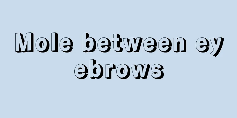 Mole between eyebrows
