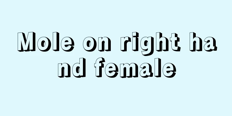 Mole on right hand female