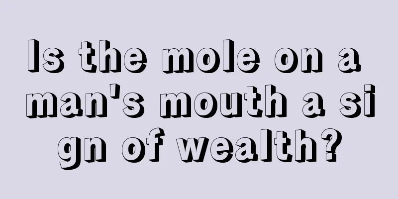 Is the mole on a man's mouth a sign of wealth?