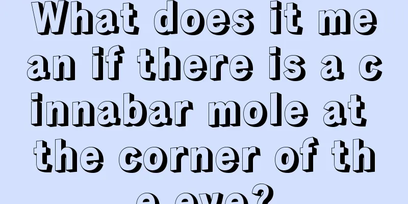 What does it mean if there is a cinnabar mole at the corner of the eye?