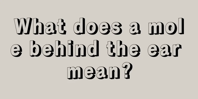 What does a mole behind the ear mean?