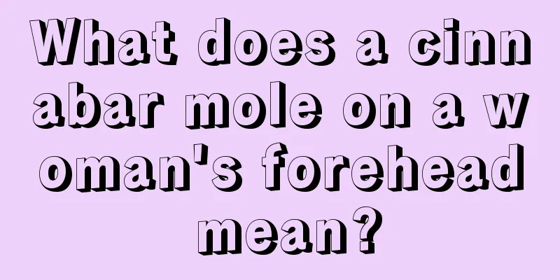 What does a cinnabar mole on a woman's forehead mean?