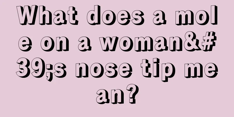 What does a mole on a woman's nose tip mean?