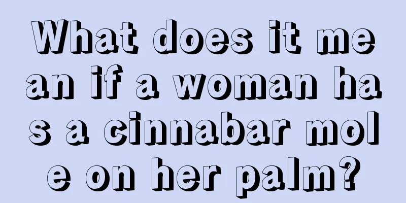 What does it mean if a woman has a cinnabar mole on her palm?