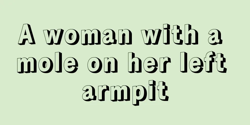 A woman with a mole on her left armpit