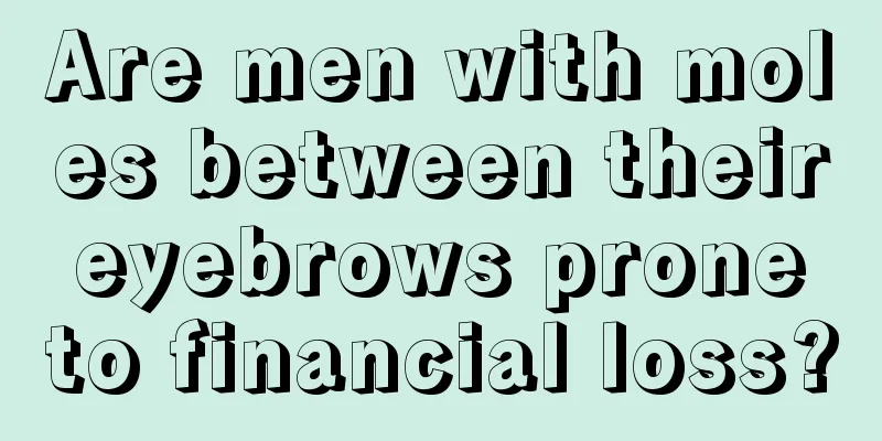 Are men with moles between their eyebrows prone to financial loss?