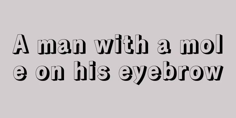 A man with a mole on his eyebrow