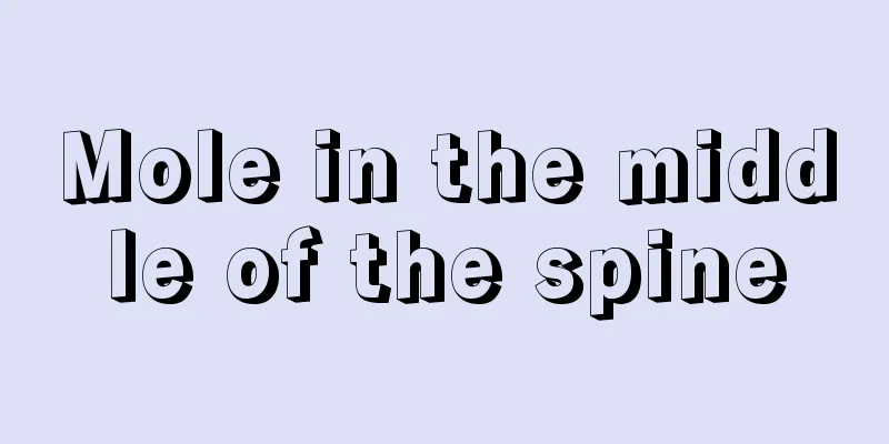 Mole in the middle of the spine