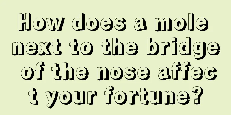 How does a mole next to the bridge of the nose affect your fortune?