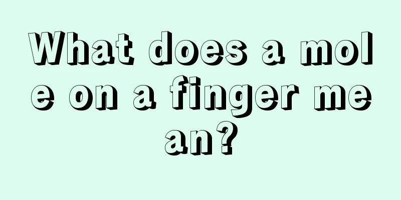 What does a mole on a finger mean?