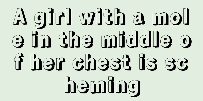 A girl with a mole in the middle of her chest is scheming