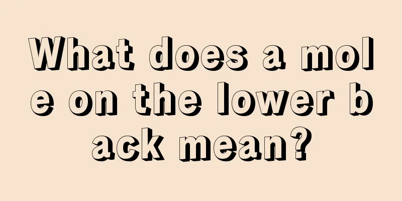 What does a mole on the lower back mean?