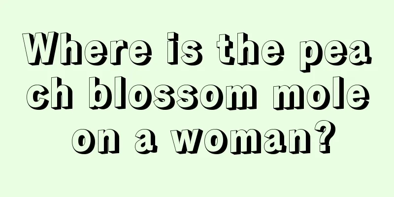 Where is the peach blossom mole on a woman?