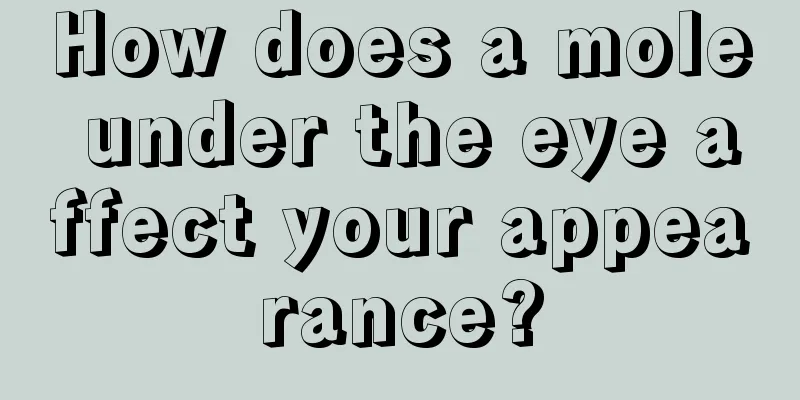 How does a mole under the eye affect your appearance?