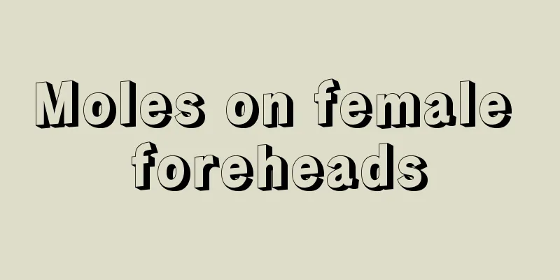 Moles on female foreheads
