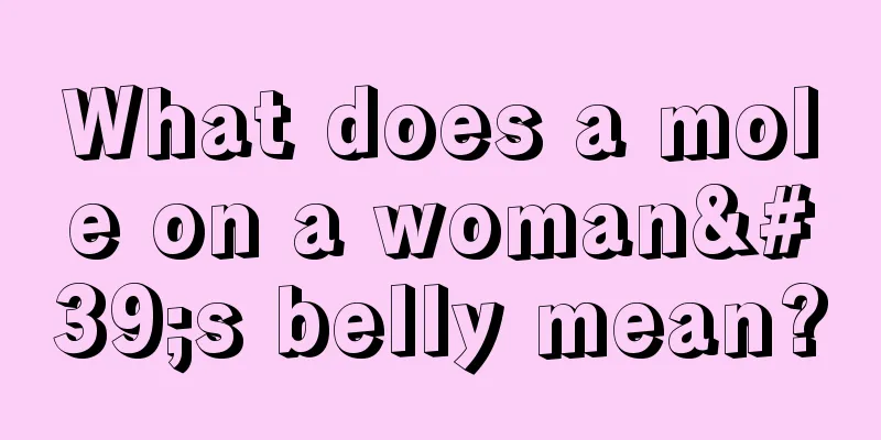What does a mole on a woman's belly mean?