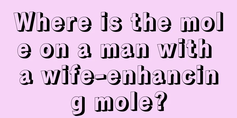 Where is the mole on a man with a wife-enhancing mole?
