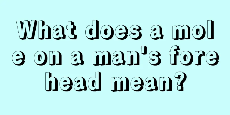 What does a mole on a man's forehead mean?