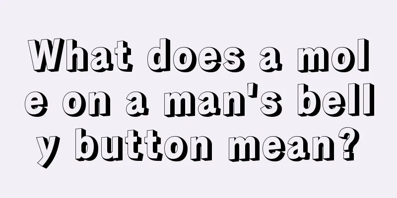What does a mole on a man's belly button mean?